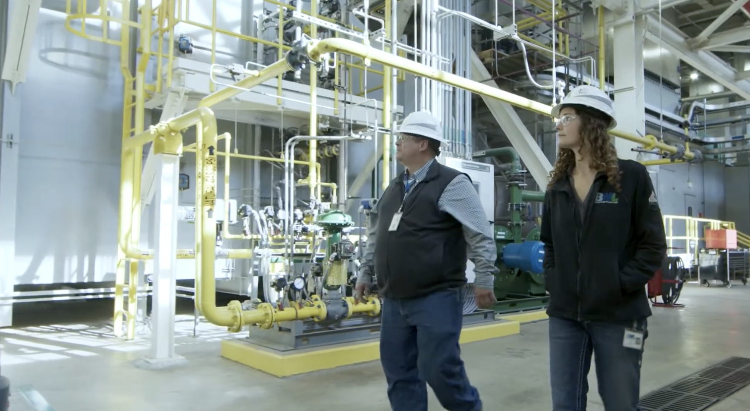 Rachel walking the REO Cogeneration Plant. 