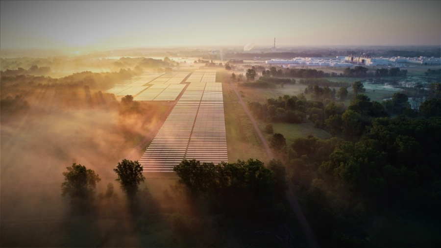 The sun rises over Delta solar panels.