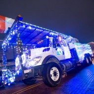 A utility truck is decorated for the Silver Bells in the City parade.