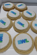 sugar cookies with white frosting and a BWL logo